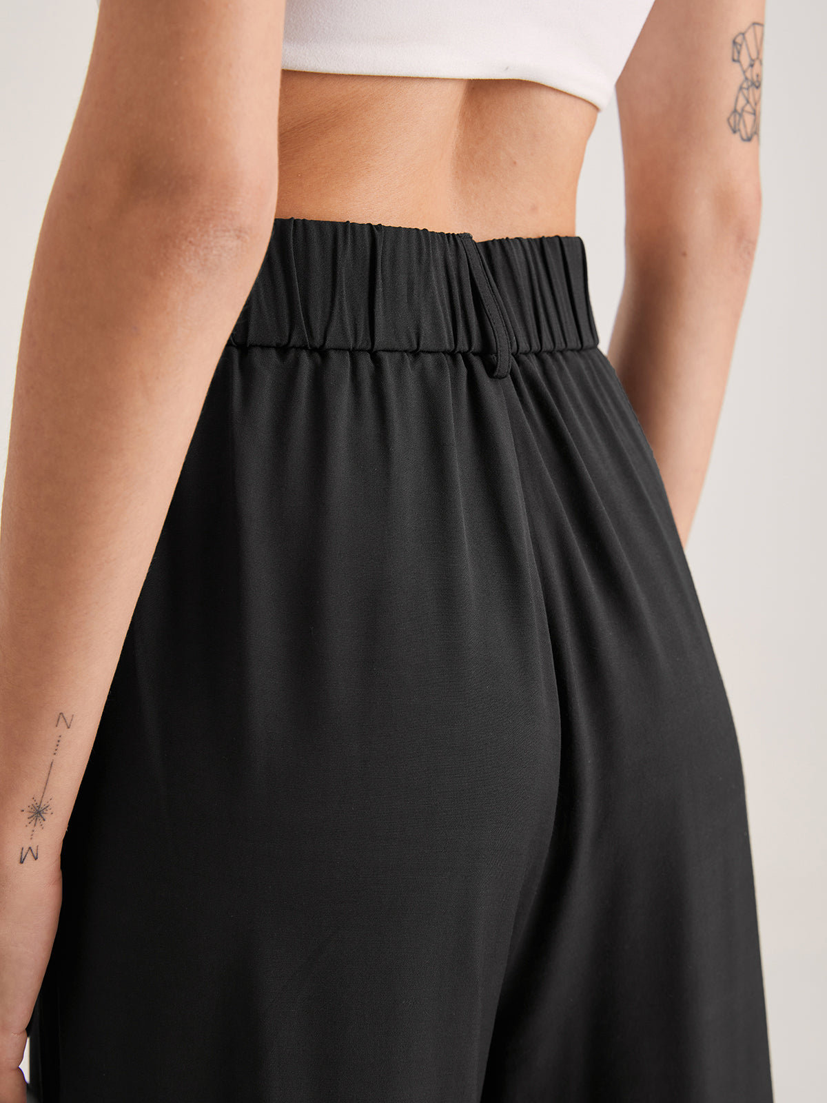 Nadia – High-Waisted Pleated Pants
